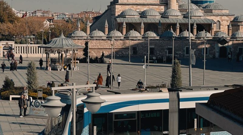 view of tram and the mevlana museum in the background in konya turkey